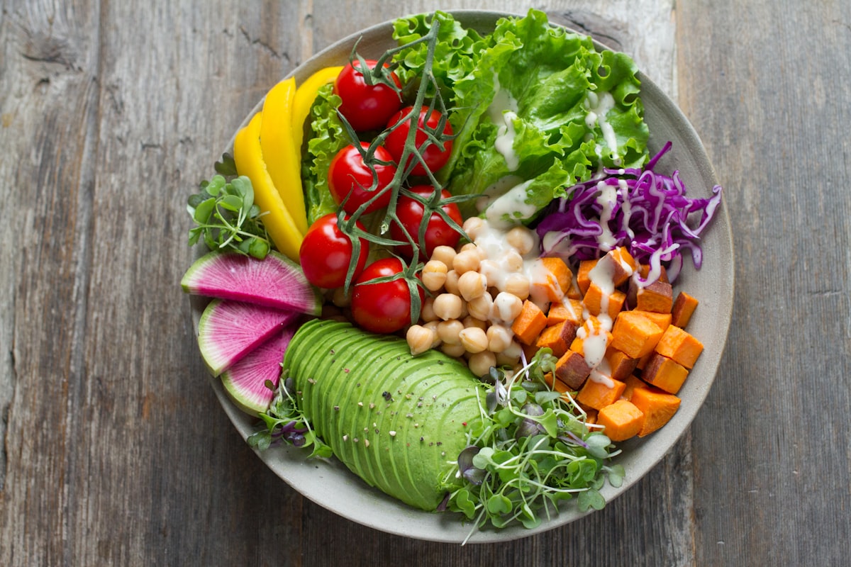 Colorful healthy meal prep with vegetables and greens